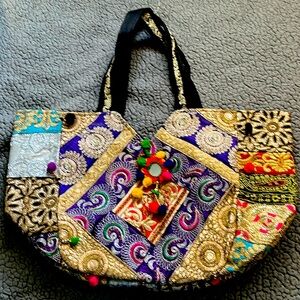 Huge colorful purse/bag! Great for shopping or traveling bag.